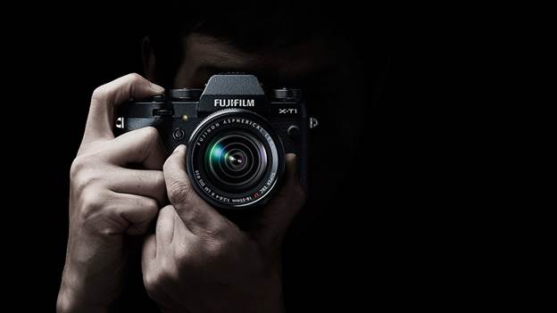 Fujifilm X T1 Body Under the ISO speed dial, is the drive mode dial, which includes advanced shooting modes
