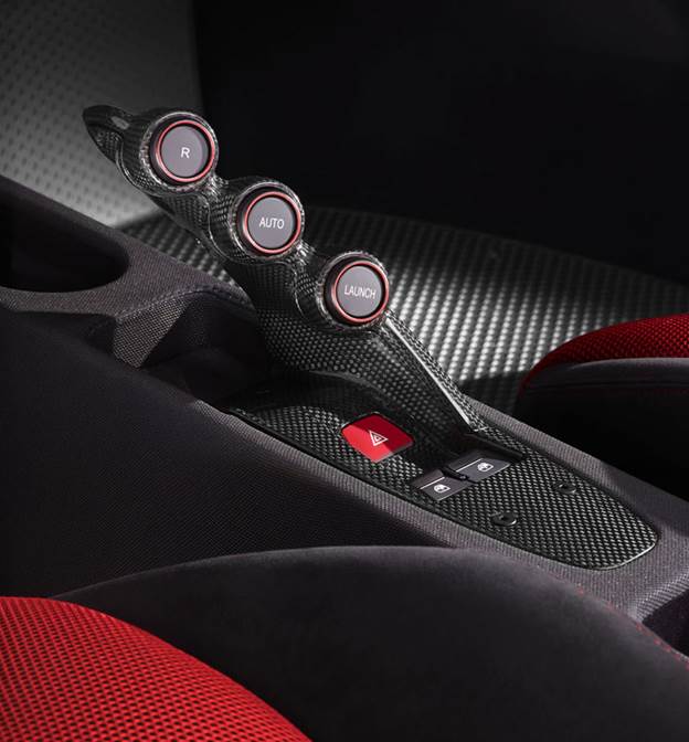 Central stalk inspired by LaFerrari supercar. The key button is marked simply 'Launch'. Apollo rockets had something similar