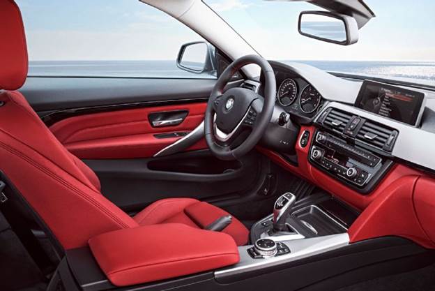 The M3/4 cabins feature a mix of luxury and sport, with an M Sport leather multifunction steering wheel, front bucket seats, and plenty of chrome trim