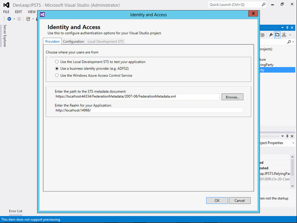 A screen shot showing the UI of the Identity and Access Tool for federating a web application in Visual Studio 2012. It includes a section where you can choose between using a local development STS, using a business IP, and using Windows Azure ACS. Below this section are two fields where you can provide the URL of the FederationMetadata.xml file of the target IP/STS, as well as the realm (that is, the web address) of your application, which will be used to present the relying party to the IP/STS.