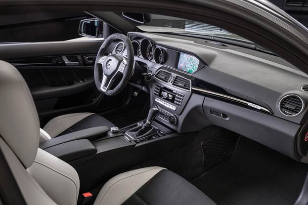 Interior appointments are limited to black or white leather, trimmed with black faux suede – which also wraps the steering wheel – and contrast stitching